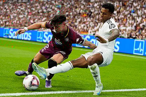 La liga 2024-25: Real Madrid's Rodrygo, right, and Valladolid's Luis Perez challenge for the ball